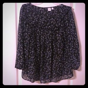 A see through floral blouse